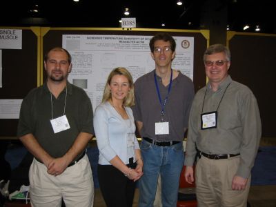 Nicolas Brunet, Lisa Compton, Tom Asbury, and Dr. Bryant Chase posing for a picture during the Wednesday afternoon poster session.