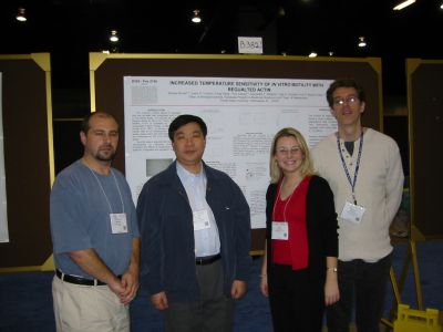 Nicolas Brunet, Fang Wang, Lisa Compton, and Tom Asbury setting up the poster.